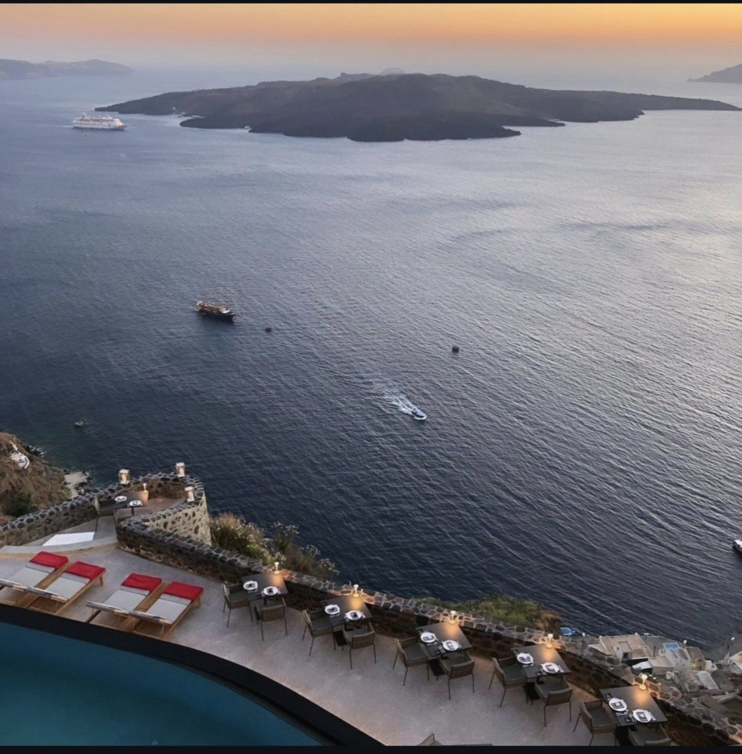 View over the Santorini caldera and the volcano at sunset